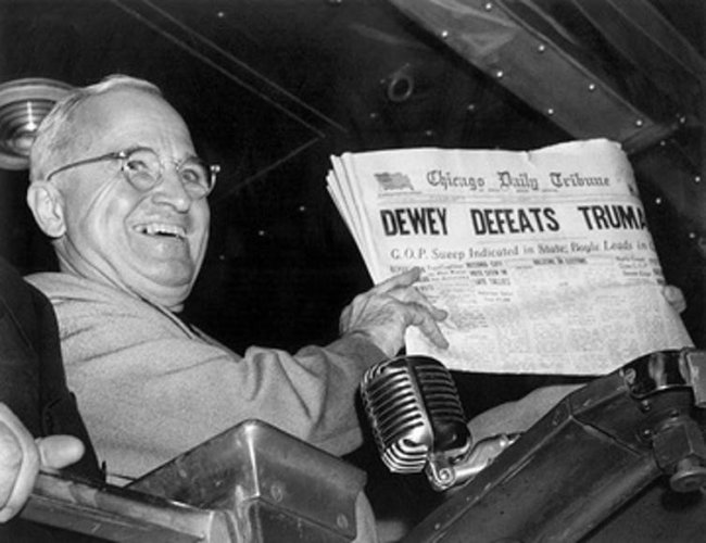 Harry S Truman holding a copy of the Chicago Daily Tribune wrongly calling the election for his rival Thomas E Dewey