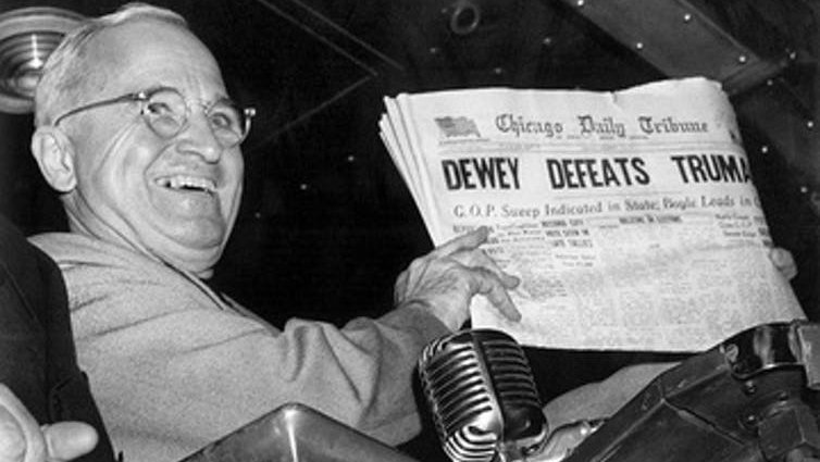 Harry S Truman holding a copy of the Chicago Daily Tribune wrongly calling the election for his rival Thomas E Dewey