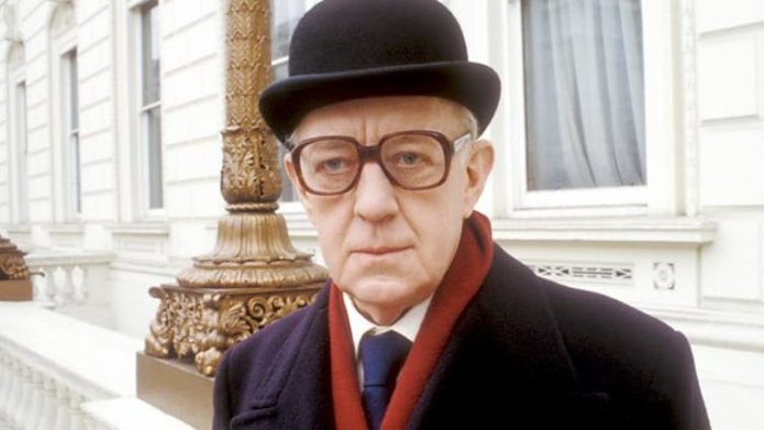 Alec Guinness in costume for his role as spymaster George Smiley in the BBC production of Tinker Tailor Soldier Spy.