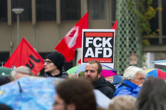 A sign at a protest reading 'FCK AFD'