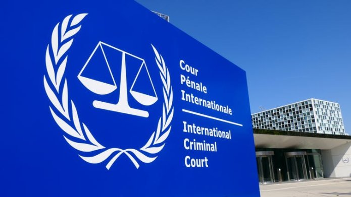 Close-up of the blue sign outside the International Criminal Court