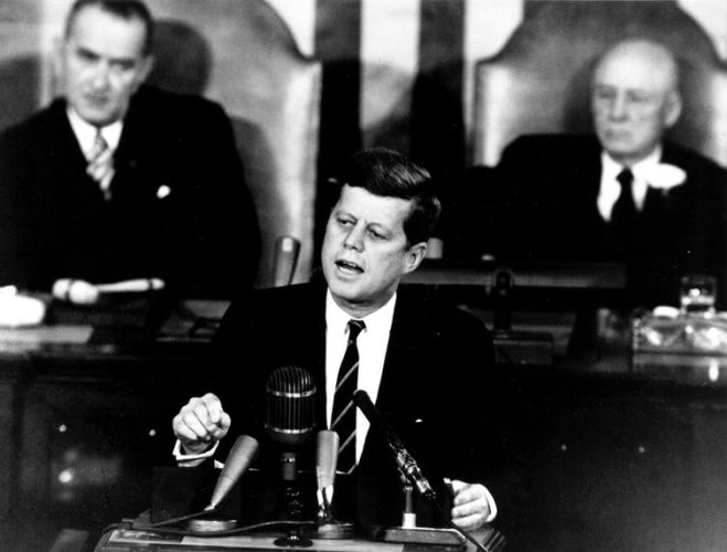 President John F. Kennedy addresses the US Congress in 1961 with vice President Lyndon Johnson, and (right) Speaker of the House Sam T. Rayburn.