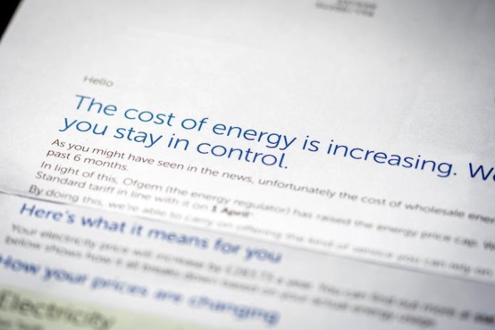 A letter reading 'the cost of energy is increasing'.