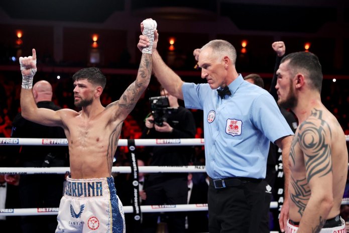 Joe Cordina celebrates winning his IBF super-featherweight world title back