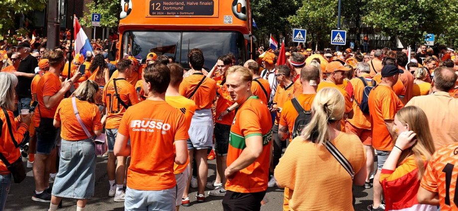 Five England fans 'injured' after Dutch hooligans attack bars as UK police speak