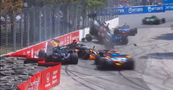 Horror IndyCar crash as car flies through air upside down in seven vehicle smash