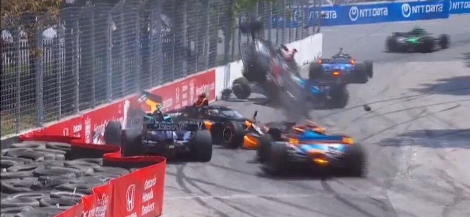 Horror IndyCar crash as car flies through air upside down in seven vehicle smash