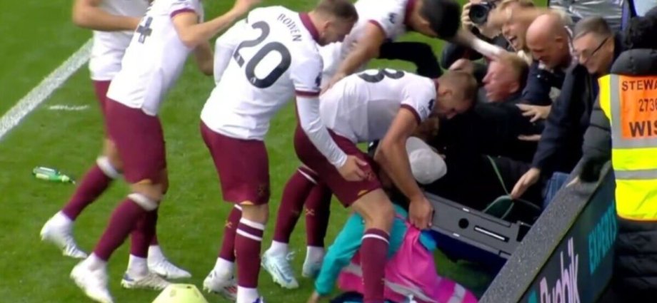 Advertising hoarding collapses on ballboy during West Ham goal celebration