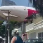 Blimp hired by football team crashes into row of houses in scary moment