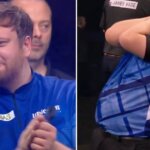 Cameron Menzies fights tears after Grand Slam of Darts win over James Wade