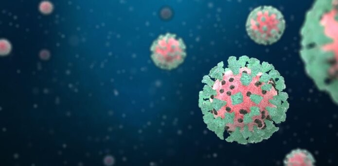 Lots of people wearing masks, walking down a street in New York City.