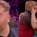 Darts ace in tears during World Champ match after appearing to make rude gesture