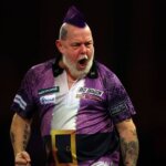 Peter Wright through to Darts World Championships third round after huge win