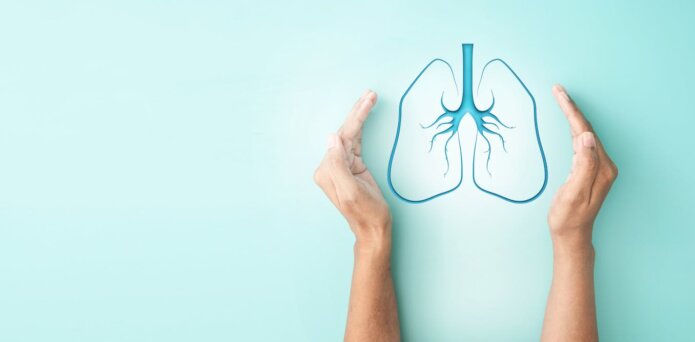 A prednisone pill on grey background.