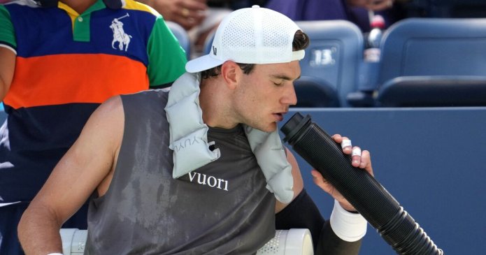 Jack Draper cleans up his own vomit as he makes winning start at US Open