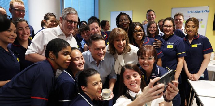 Pink milkshake in a glass.