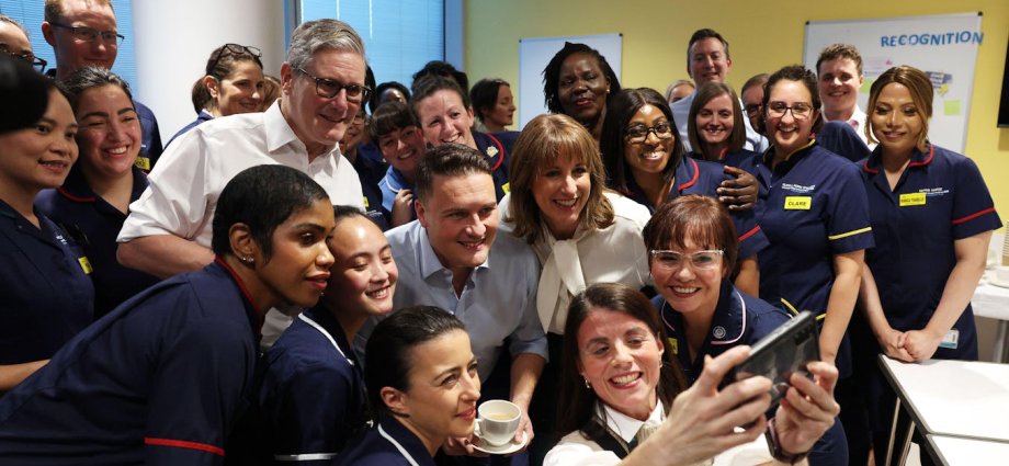 Pink milkshake in a glass.