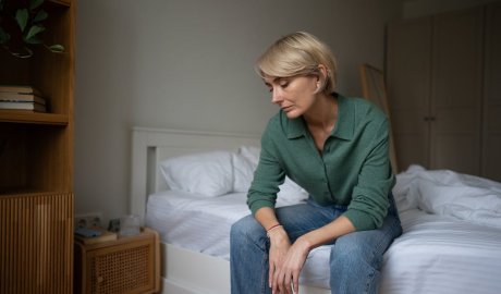 A business woman hard at work at her desk.