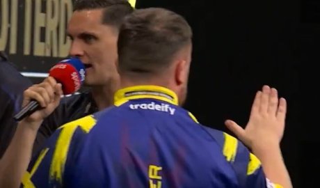 Luke Littler gestures to Premier League crowd following Gian van Veen spat