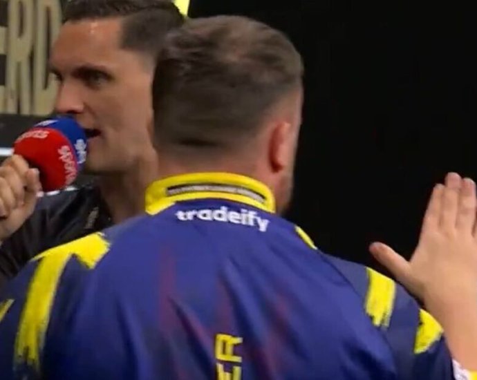 Luke Littler gestures to Premier League crowd following Gian van Veen spat