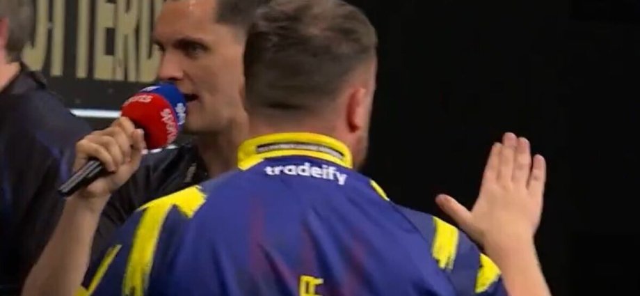 Luke Littler gestures to Premier League crowd following Gian van Veen spat