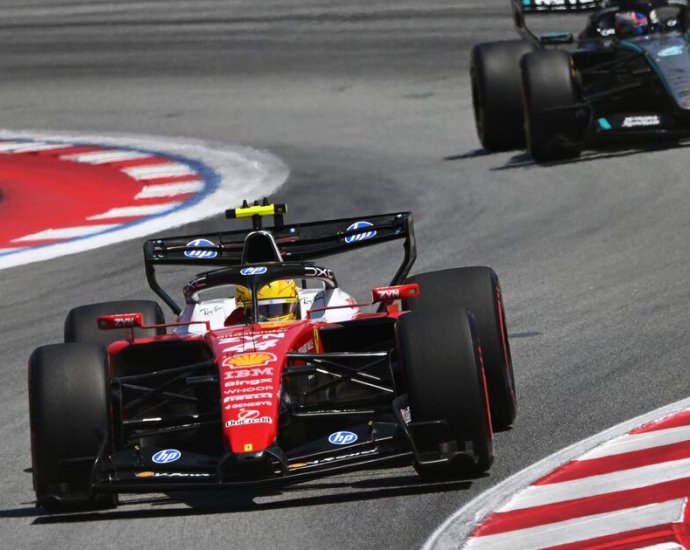 F1 LIVE: Lewis Hamilton chasing victory at Barcelona GP as Russell battle looms