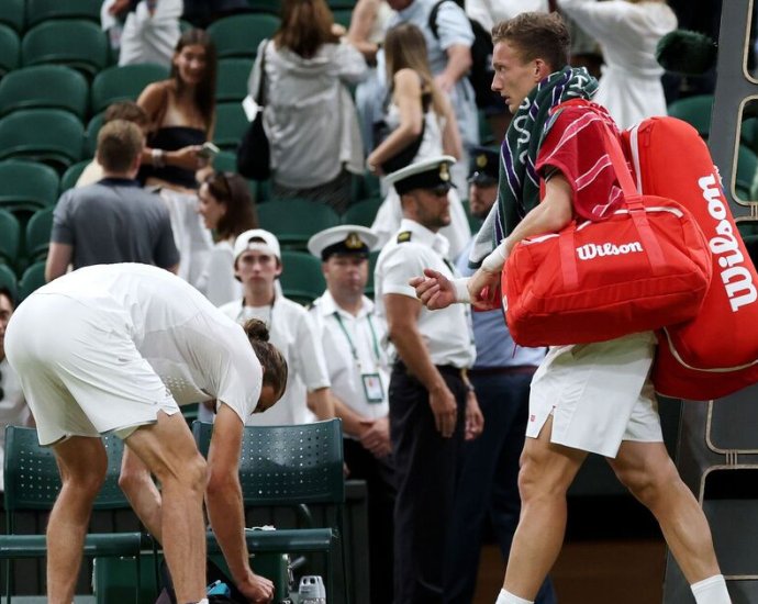 Two Wimbledon stars ordered off court as huge handshake row erupts