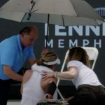 Tennis star collapses on court as opponent bursts into tears in scary incident